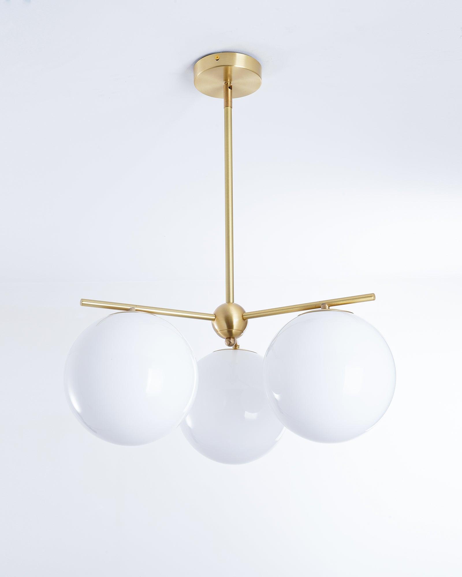 Modern Brass Chandelier with Glass Spheres
