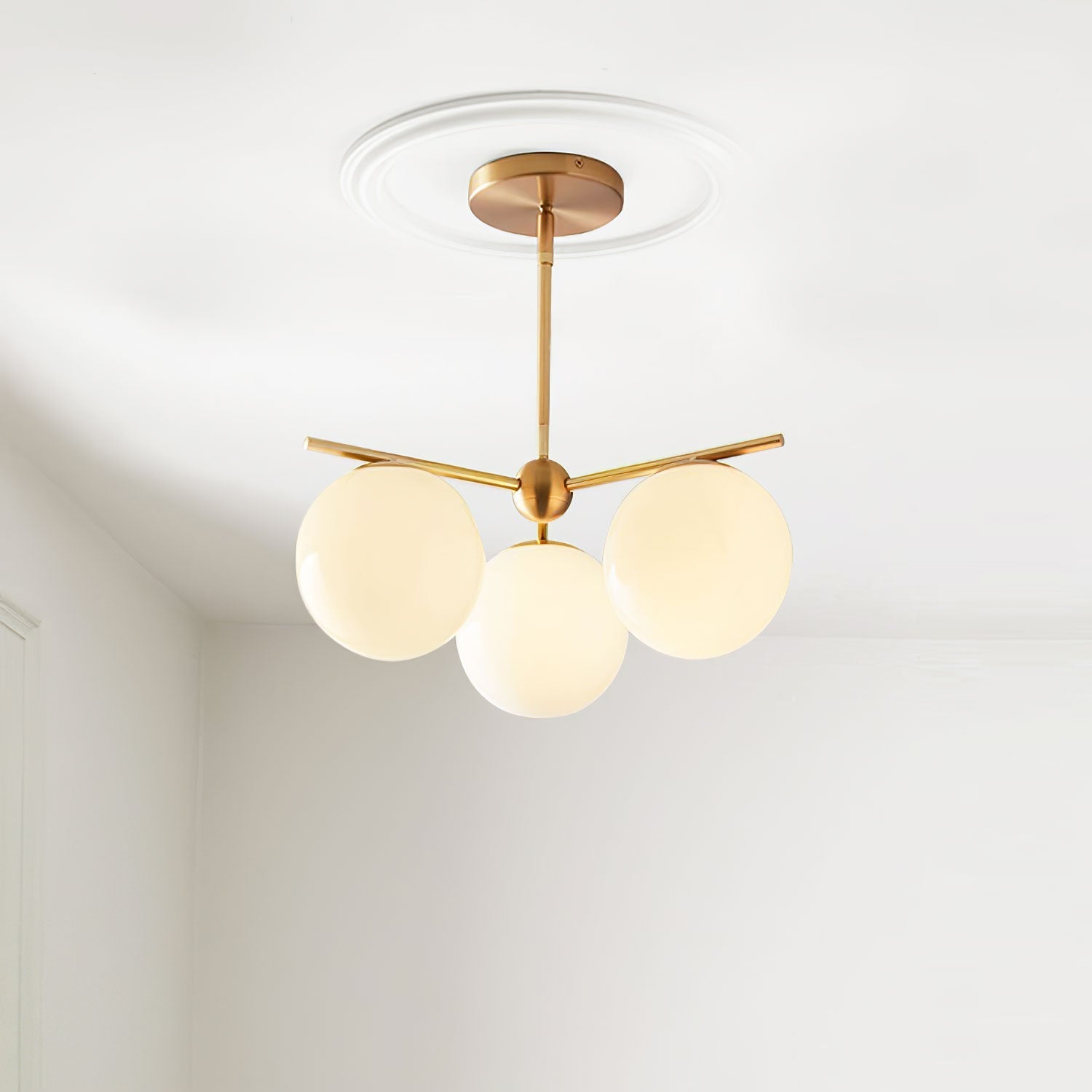 Modern Brass Chandelier with Glass Spheres