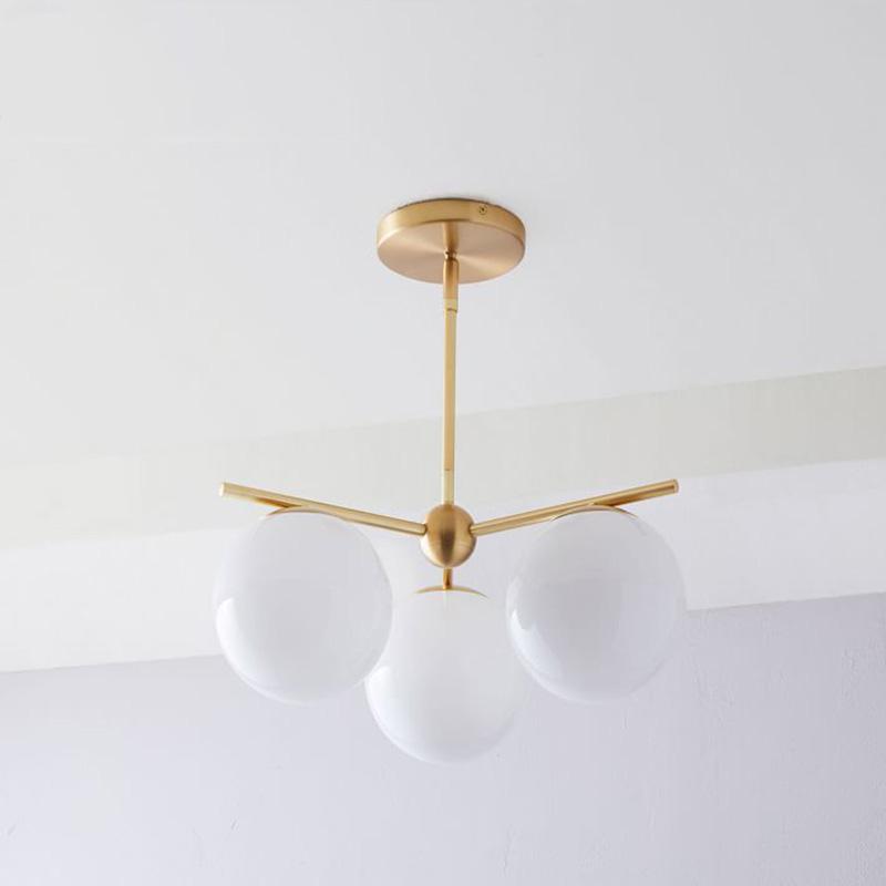Modern Brass Chandelier with Glass Spheres