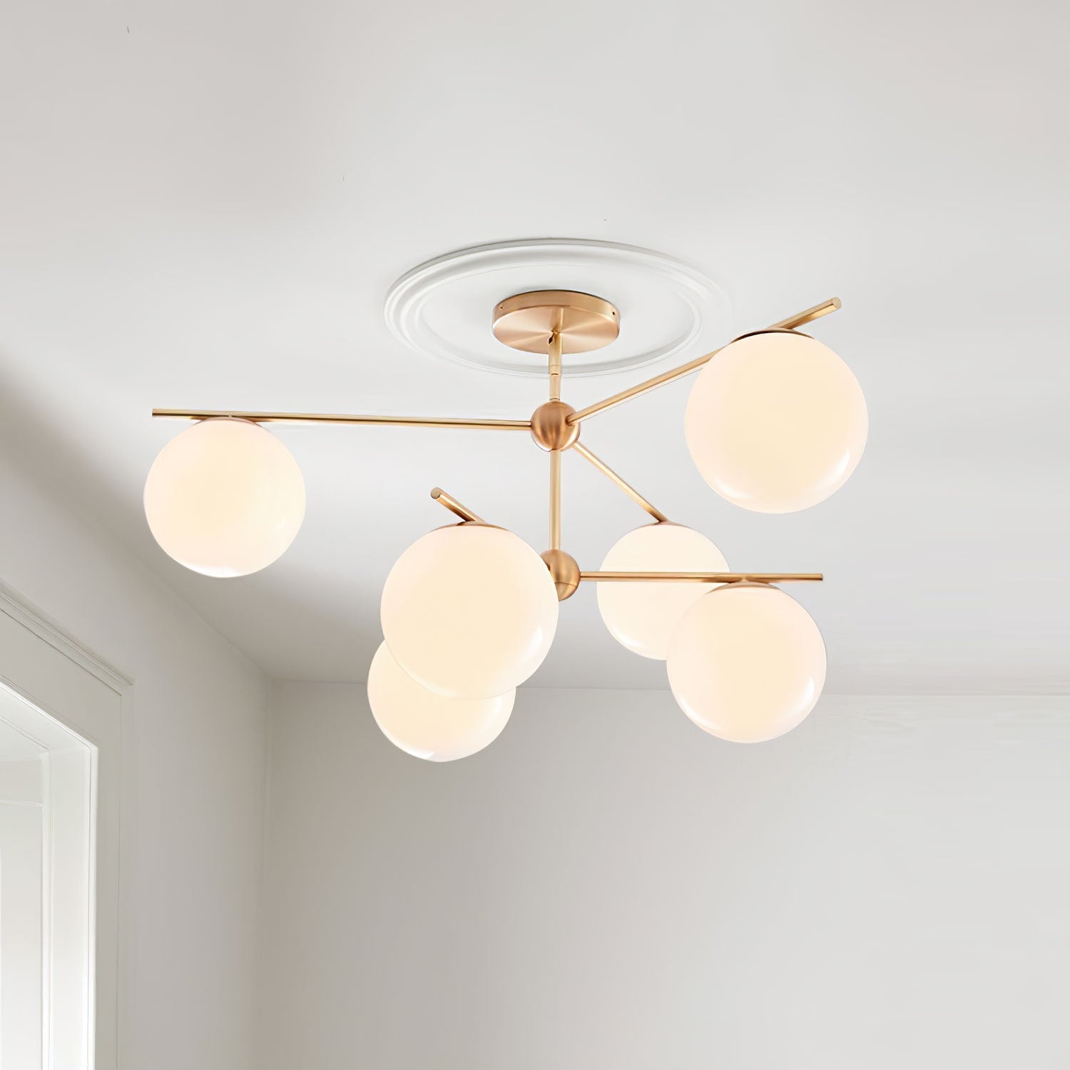 Modern Brass Chandelier with Glass Spheres