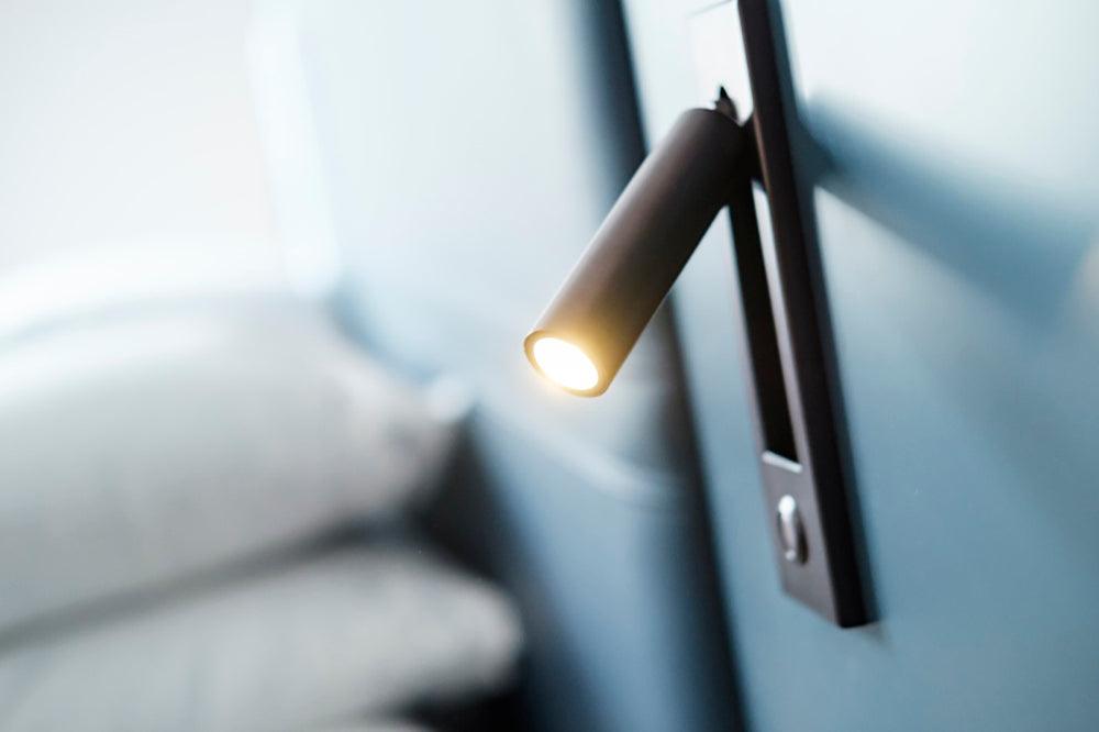 Minimalist Wall Sconce with Adjustable Cylindrical LED