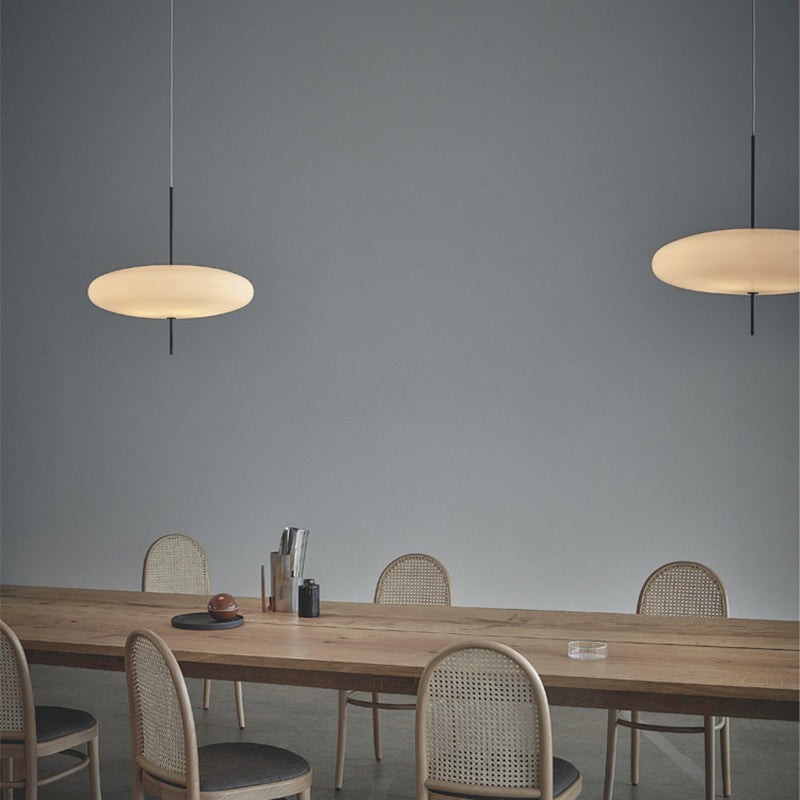 Minimalist Elliptical Pendant Light with Vertical Rod