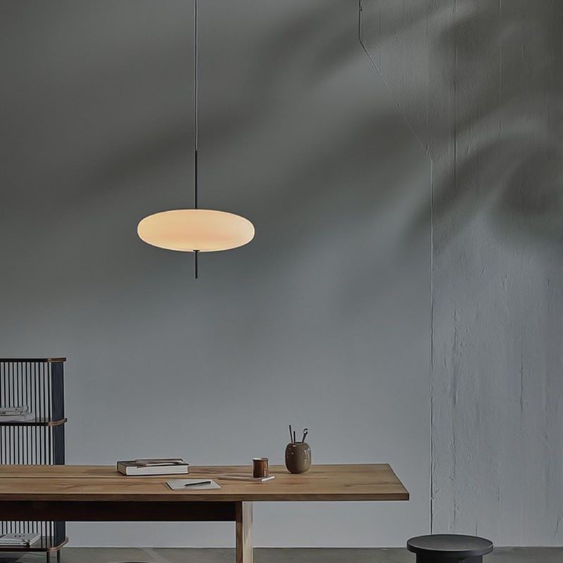 Minimalist Elliptical Pendant Light with Vertical Rod