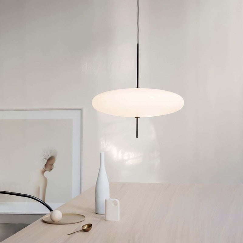 Minimalist Elliptical Pendant Light with Vertical Rod