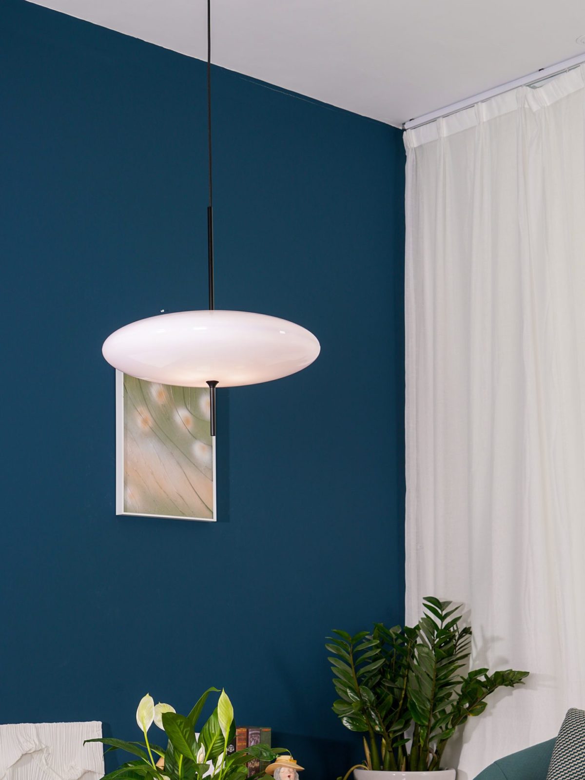 Minimalist Elliptical Pendant Light with Vertical Rod