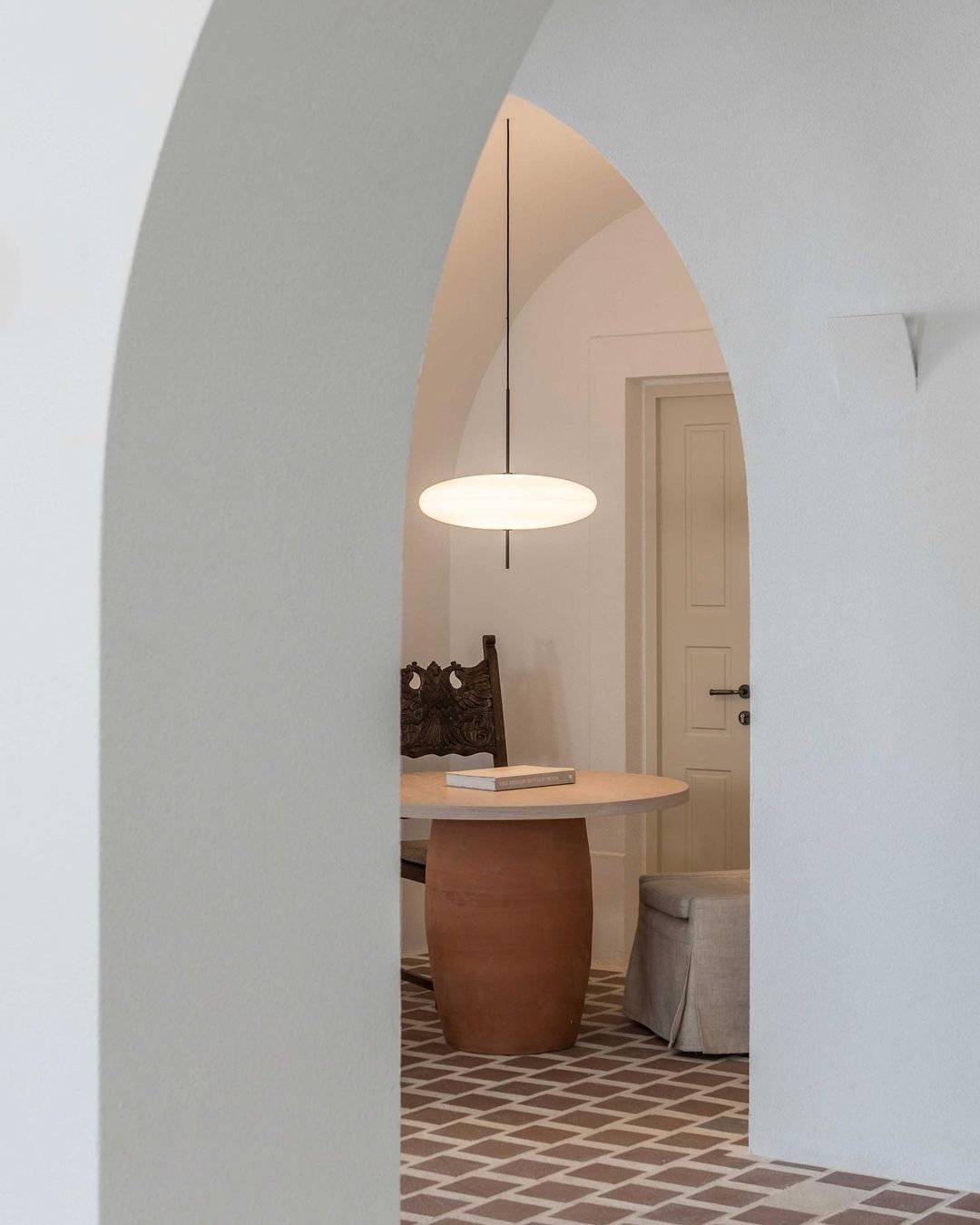 Minimalist Elliptical Pendant Light with Vertical Rod
