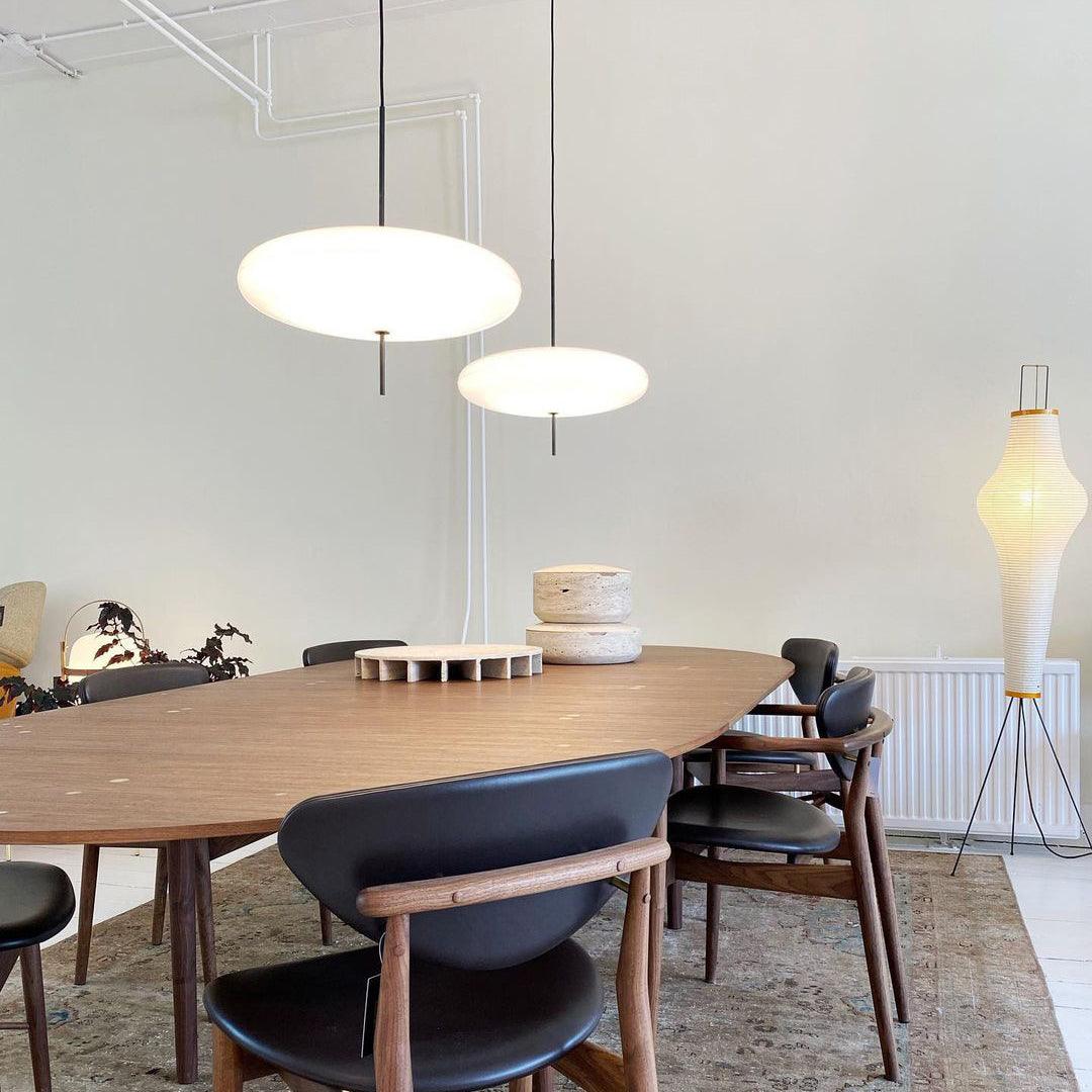 Minimalist Elliptical Pendant Light with Vertical Rod