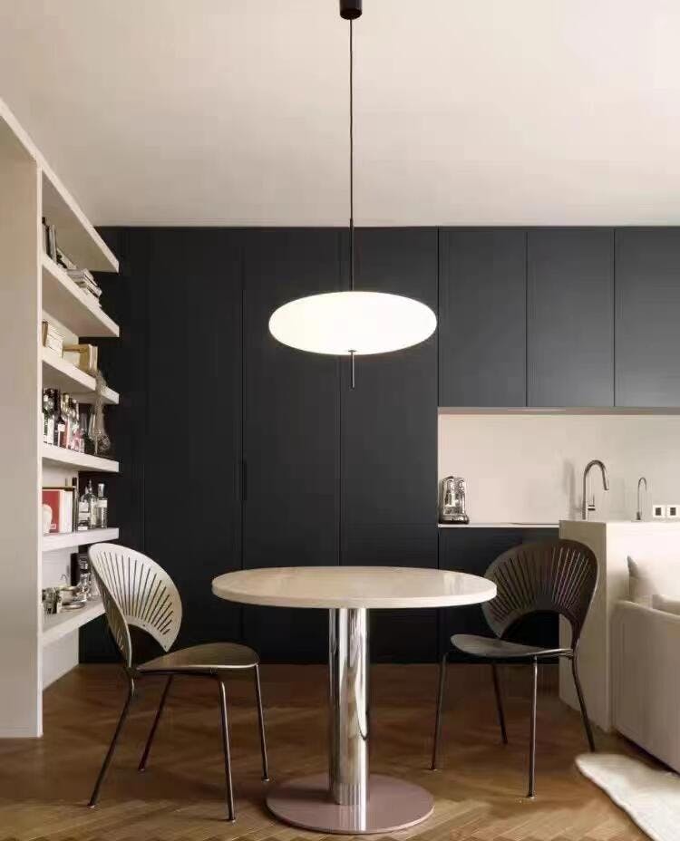 Minimalist Elliptical Pendant Light with Vertical Rod