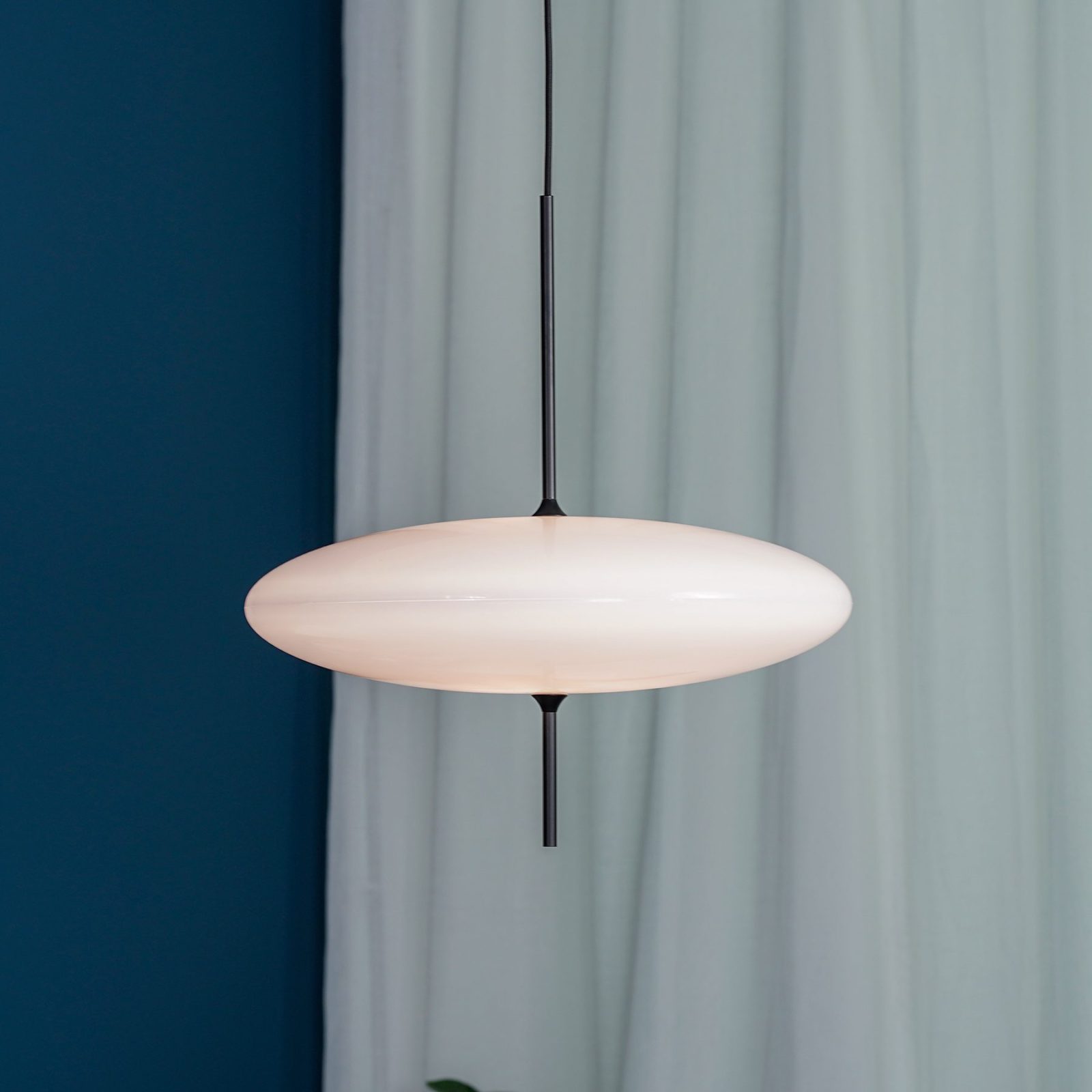 Minimalist Elliptical Pendant Light with Vertical Rod