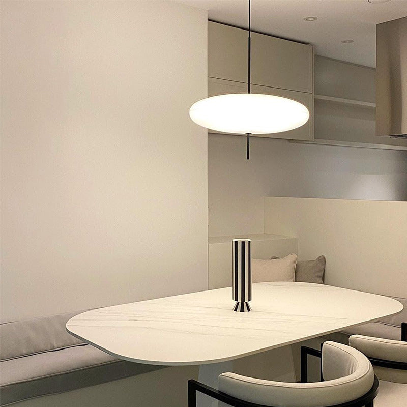 Minimalist Elliptical Pendant Light with Vertical Rod