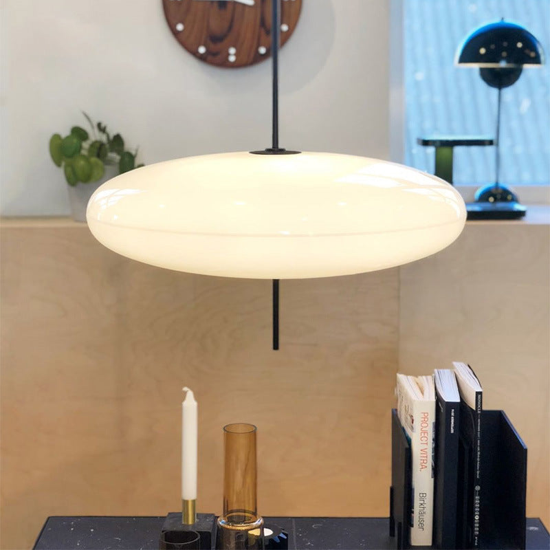 Minimalist Elliptical Pendant Light with Vertical Rod
