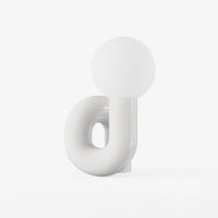 Contemporary Table Lamp with Voluminous N-Shaped Base