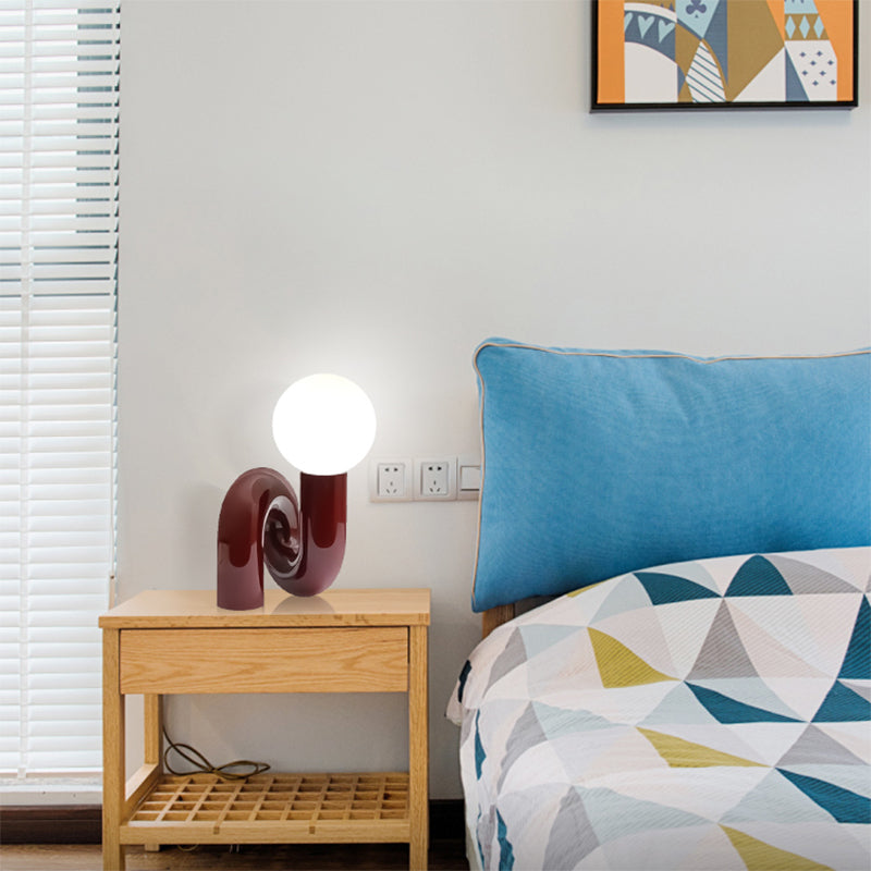 Contemporary Table Lamp with Voluminous N-Shaped Base
