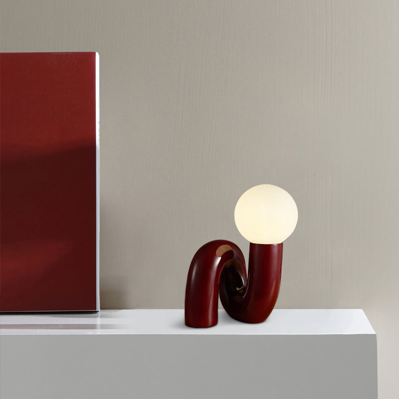 Contemporary Table Lamp with Voluminous N-Shaped Base