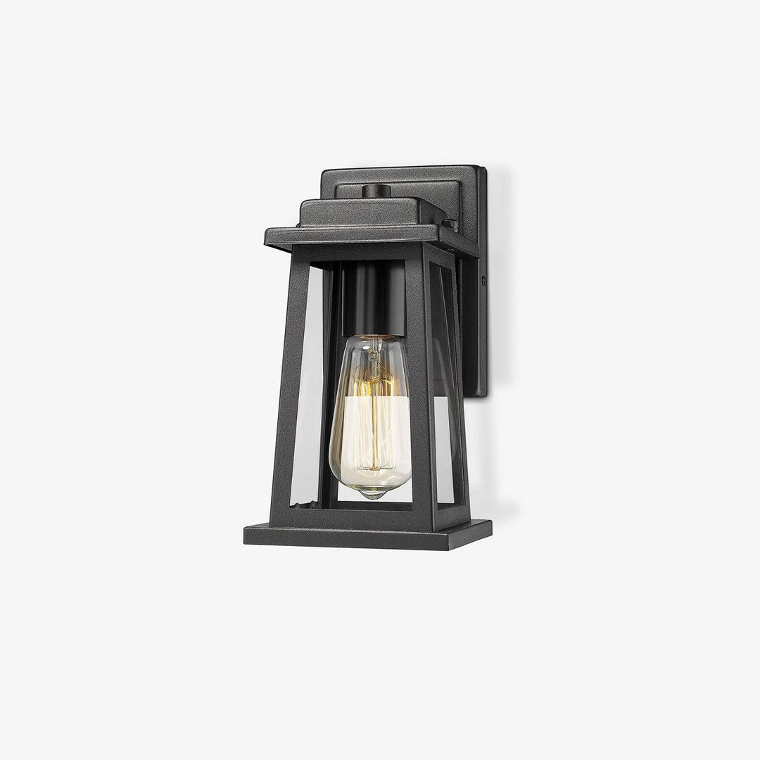 Modern classic outdoor lantern wall lamp with black metal frame and clear glass panels, perfect for enhancing patios, porches, and gardens with sleek lighting.