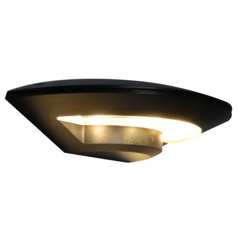 Modern flying saucer-shaped LED outdoor wall lamp with a sleek black metal design. Waterproof and ideal for gardens, patios, and pathways. Energy-saving and stylish lighting solution.
