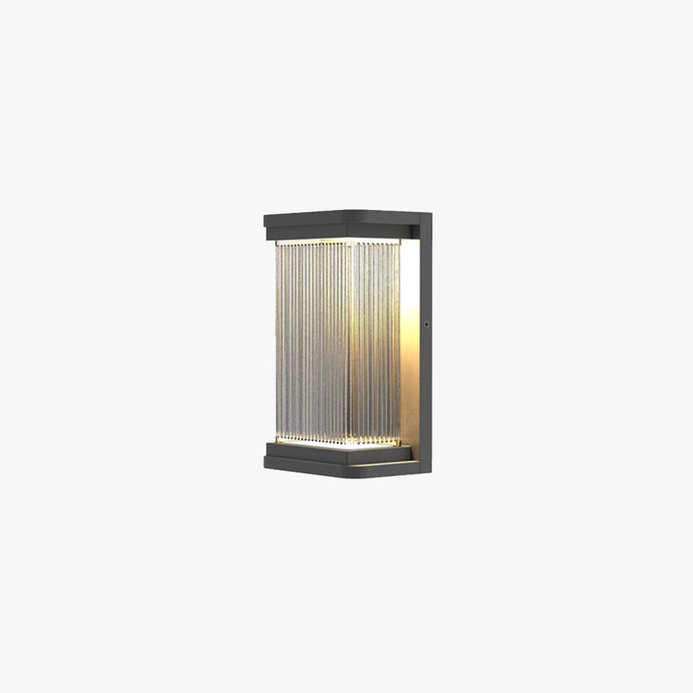Rectangular glass outdoor wall lamp with black metal frame and vertical pattern glass. Waterproof design, ideal for patios, fences, and gardens. Modern and minimalist style for outdoor lighting.