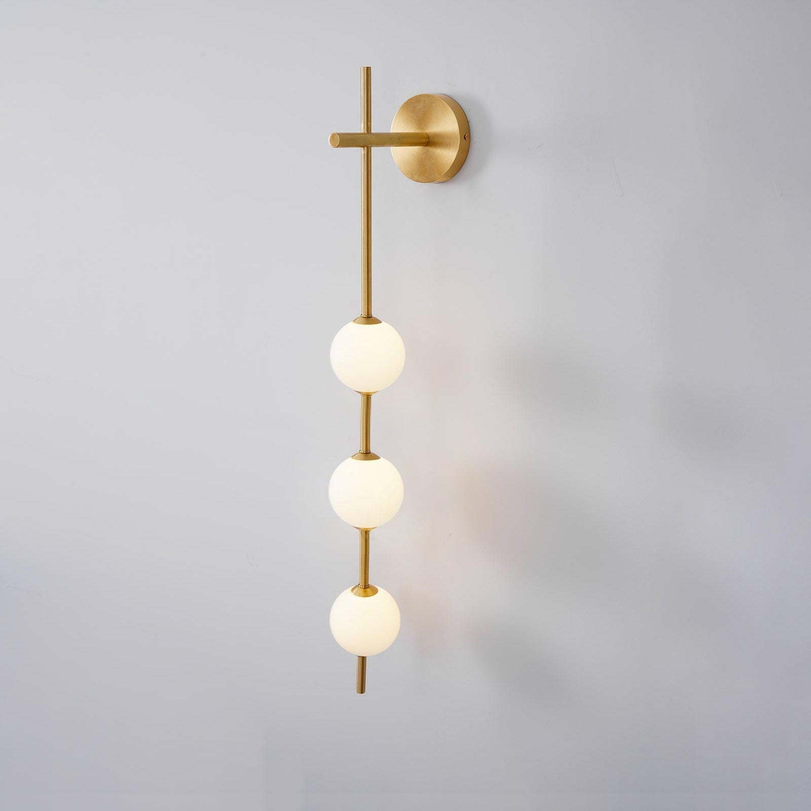 Contemporary Vertical Globe Wall Sconce – Matte White