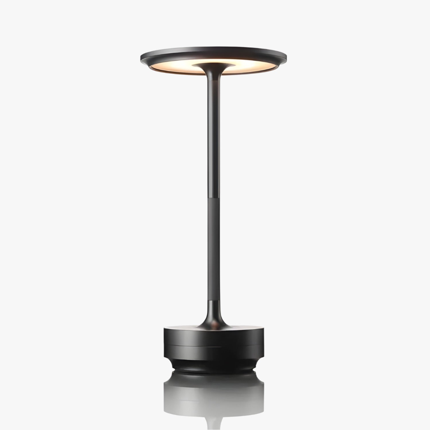 Minimalist black cordless desk lamp with rechargeable design, isolated on a white background.