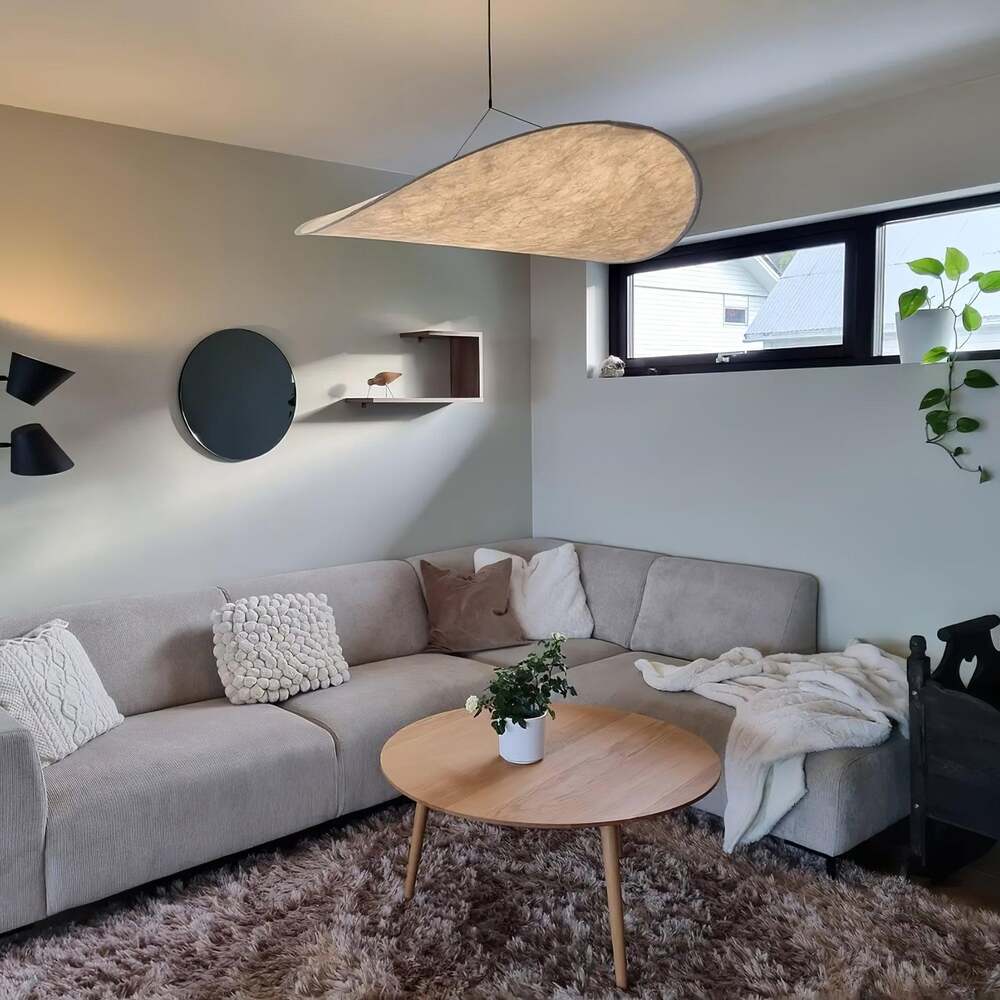 CloudGlo LED Pendant Light enhancing a cozy living room decor.