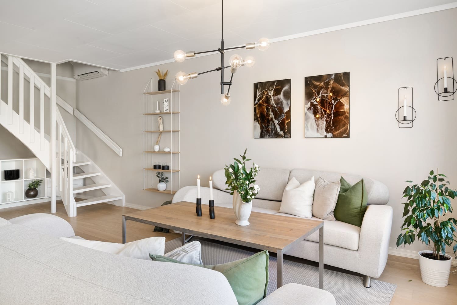 Cozy living room with custom pendant lighting and modern interior design.