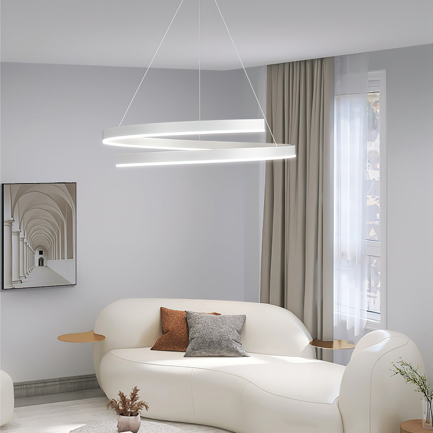 White modern pendant light with adjustable dimmable LED rings in a living room