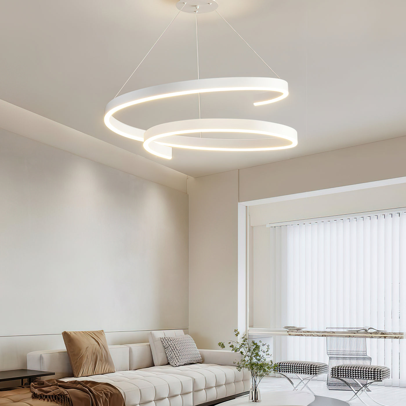 White modern pendant light with adjustable dimmable LED rings in a living room