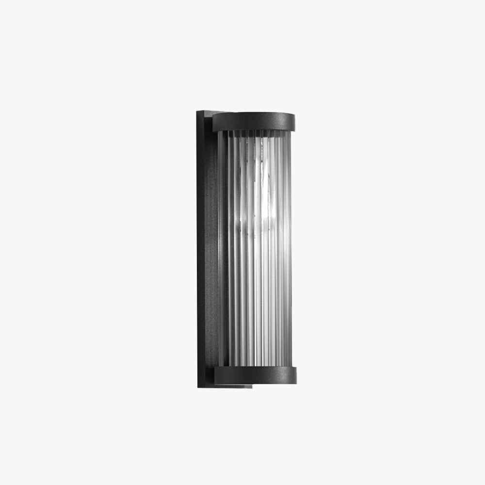 Modern cylindrical outdoor wall lamp with a black metal frame and striped glass shade. Waterproof and available in solar or hardwired options. Ideal for gardens, patios, and outdoor spaces.

