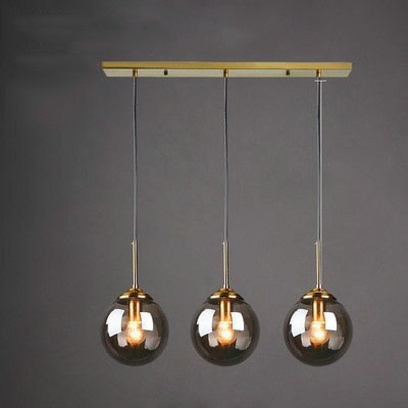 Modern Sphere Pendant Light with Amber Glass